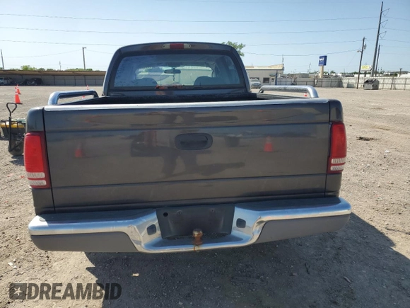 2003 Dodge Dakota SLT with VIN 1D7HL48X03S114761, listed as a Copart auction lot 52323405 with 137,105 mi miles and Salvage Title. Bid and sale history available at carsss.com. Image 6.