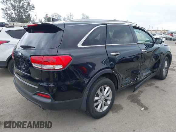 2016 Kia Sorento LX with VIN 5XYPGDA39GG153135, listed as a IAAI auction lot 41903352 with 144,557 mi miles. Bid and sale history available at carsss.com. Image 4.