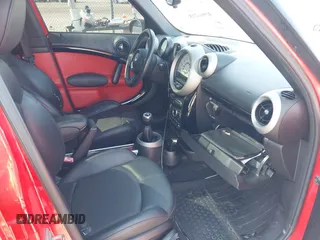 2012 MINI Countryman S z VIN WMWZC3C55CWM27826, wystawiony jako IAAI lot #42065318 z przebiegiem 120 852 mil mil oraz . Historia ofert i sprzedaży dostępna na DreamBid. Obrazek 5.