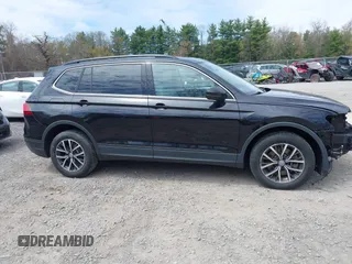 2019 Volkswagen Tiguan SE with VIN 3VV2B7AX7KM174382, listed as a IAAI auction lot 42147584 with 64,460 mi miles and . Bid and sale history available at DreamBid. Image 13.