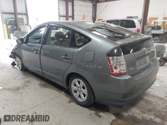 2005 Toyota Prius with VIN JTDKB20U453123405, listed as a IAAI auction lot 42080386 with 262,688 mi miles and . Bid and sale history available at DreamBid. Image 3.