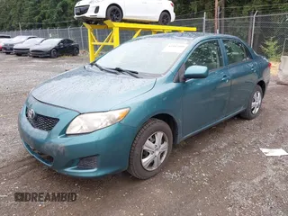 2010 Toyota Corolla with VIN 1NXBU4EE3AZ165944, listed as a IAAI auction lot 42597459 with 211,824 mi miles and . Bid and sale history available at DreamBid. Image 2.