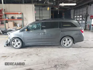 2011 Honda Odyssey Touring с VIN 5FNRL5H90BB025855, выставлен на аукционе IAAI как лот 42104979 с пробегом 165 010 миль миль и . История ставок и продаж доступна на DreamBid. Изображение 15.