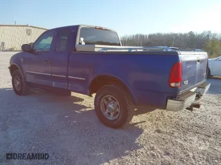 1998 Ford F-150 Standard with VIN 1FTRX18L4WKB26155, listed as a IAAI auction lot 41770257 with 319,239 mi miles. Bid and sale history available at carsss.com. Image 3.