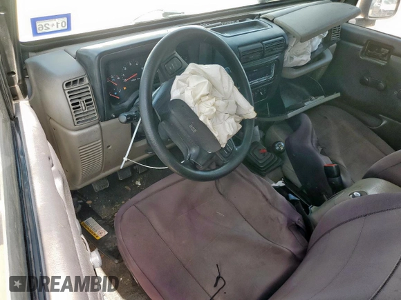2004 Jeep Wrangler Sport z VIN 1J4FA49SX4P802341, wystawiony jako Copart lot #62752565 z przebiegiem 150 197 mil mil oraz Szkoda całkowita • Salvage title. Historia ofert i sprzedaży dostępna na DreamBid. Obrazek 8.