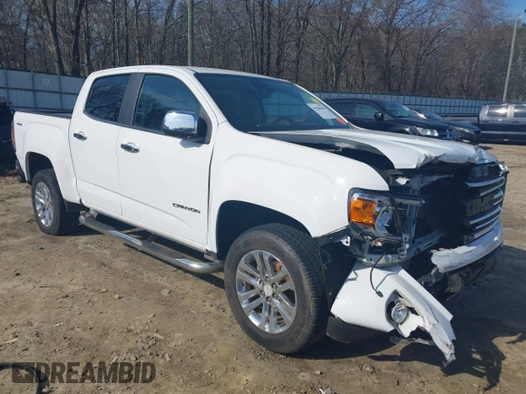 2015 GMC Canyon 4WD SLT with VIN 1GTG6CE30F1269698, listed as a IAAI auction lot 41508606 with 83,566 mi miles. Bid and sale history available at carsss.com. Image 1.