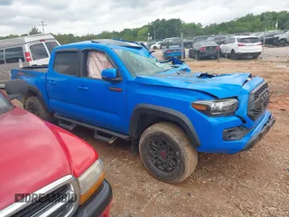 2019 Toyota Tacoma SR with VIN 5TFCZ5AN6KX180296, listed as a IAAI auction lot 42343756 with 34,469 mi miles and . Bid and sale history available at DreamBid. Image 1.