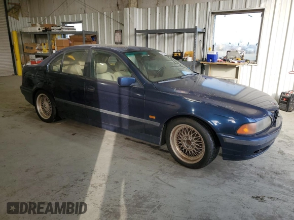 2000 BMW 5 Series 528iA with VIN WBADM6346YGU08106, listed as a Copart auction lot 84322434 with 298,587 mi miles and Clean Title. Bid and sale history available at carsss.com. Image 4.