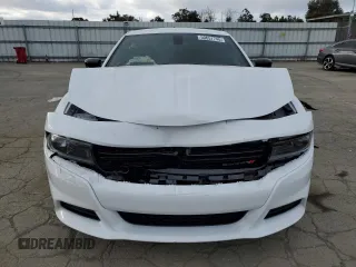 2023 Dodge Charger SXT with VIN 2C3CDXBG5PH703978, listed as a Copart auction lot 50657745 with 7,198 mi miles and Salvage Title. Bid and sale history available at carsss.com. Image 5.