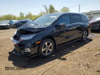 2018 Honda Odyssey Touring z VIN 5FNRL6H85JB012434, wystawiony jako Copart lot #58173265 z przebiegiem 125 278 mil mil oraz Szkoda całkowita • Salvage title. Historia ofert i sprzedaży dostępna na DreamBid. Obrazek 1.