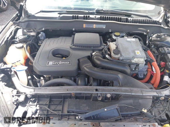 2013 Ford Fusion SE Hybrid z VIN 3FA6P0LUXDR181849, wystawiony jako IAAI lot #41949276 z przebiegiem 112 688 mil mil oraz . Historia ofert i sprzedaży dostępna na DreamBid. Obrazek 10.