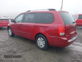 2011 Kia Sedona LX with VIN KNDMG4C71B6411453, listed as a IAAI auction lot 41316825 with 261,028 mi miles. Bid and sale history available at carsss.com. Image 3.