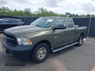 2014 Ram 1500 Tradesman with VIN 1C6RR6FG6ES233212, listed as a IAAI auction lot 41940763 with 131,914 mi miles and . Bid and sale history available at DreamBid. Image 18.