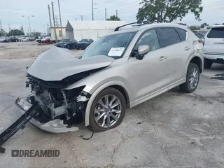 2025 Mazda CX-5 2.5 S Premium Plus Package with VIN JM3KFBEM4S0549709, listed as a IAAI auction lot 41380633 with 2,586 mi miles. Bid and sale history available at carsss.com. Image 18.