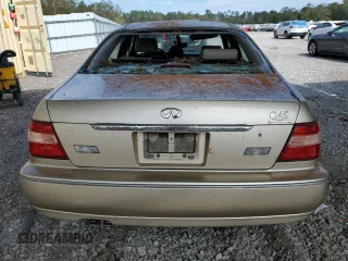 2000 Infiniti Q45 z VIN JNKBY31A0YM301297, wystawiony jako Copart lot #74672884 z przebiegiem 171 263 mil mil oraz Szkody całkowita. Historia ofert i sprzedaży dostępna na DreamBid. Obrazek 6.