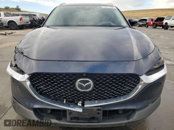 2023 Mazda CX-30 Premium Plus with VIN 3MVDMBEY9PM500907, listed as a Copart auction lot 70871494 with 38,599 mi miles and Salvage title. Bid and sale history available at DreamBid. Image 5.