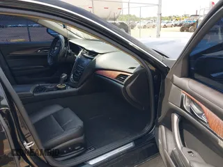 2016 Cadillac CTS AWD with VIN 1G6AW5SX7G0129019, listed as a IAAI auction lot 42148335 with 86,023 mi miles and . Bid and sale history available at DreamBid. Image 5.