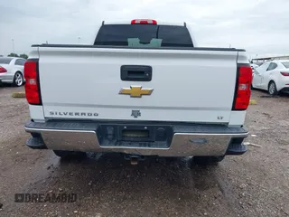 2018 Chevrolet Silverado 1500 LT with VIN 3GCPCREC7JG402401, listed as a IAAI auction lot 41880462 with 128,995 mi miles and . Bid and sale history available at DreamBid. Image 16.
