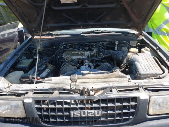 1996 Isuzu Rodeo z VIN 4S2CK58V1T4342739, wystawiony jako IAAI lot #42058798 z przebiegiem 268 502 mil mil oraz . Historia ofert i sprzedaży dostępna na DreamBid. Obrazek 10.