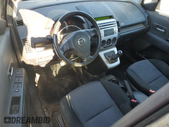 2006 Mazda 5 Sport with VIN JM1CR293160119857, listed as a Copart auction lot 86556484 with 164,418 mi miles and Salvage title. Bid and sale history available at DreamBid. Image 8.