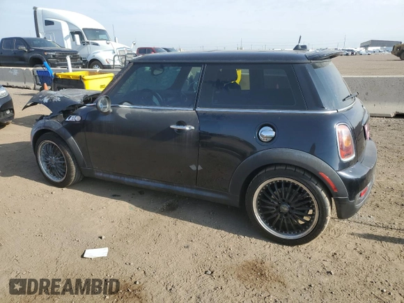 2009 MINI Hardtop S with VIN WMWMF73599TT94509, listed as a Copart auction lot 53495645 with Not provided miles and Salvage title. Bid and sale history available at DreamBid. Image 2.
