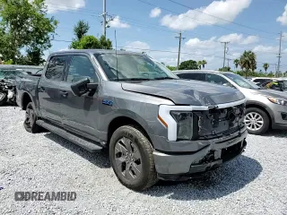 2024 Ford F-150 Lightning XLT with VIN 1FTVW3LK8RWG23783, listed as a Copart auction lot 58359625 with 5,864 mi miles and Salvage title. Bid and sale history available at DreamBid. Image 14.