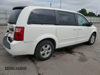 2009 Dodge Grand Caravan SE z VIN 2D8HN44EX9R533530, wystawiony jako Copart lot #59548375 z przebiegiem 130 956 mil mil oraz Szkoda całkowita • Salvage title. Historia ofert i sprzedaży dostępna na DreamBid. Obrazek 3.