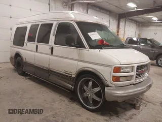 2000 GMC Savana with VIN 1GDFG15RXY1239530, listed as a IAAI auction lot 41442314 with 203,021 mi miles. Bid and sale history available at carsss.com. Image 1.