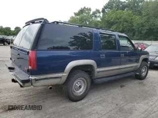 1999 GMC Suburban z VIN 1GKGK26J6XJ771768, wystawiony jako Copart lot #66300974 z przebiegiem 181 048 mil mil oraz Szkody całkowita. Historia ofert i sprzedaży dostępna na DreamBid. Obrazek 3.
