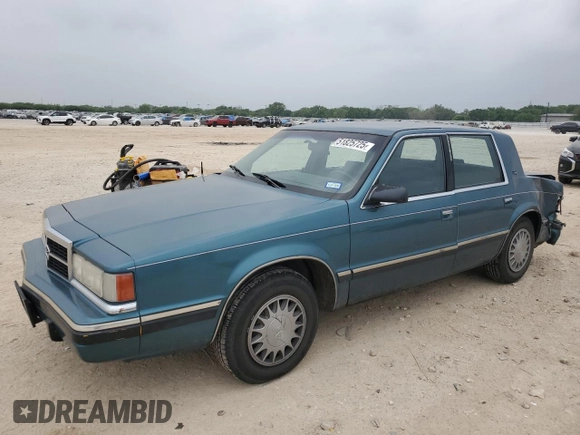 1993 Dodge Dynasty LE z VIN 1B3XC56R3PD124521, wystawiony jako Copart lot #51825725 z przebiegiem 94 336 mil mil oraz Szkoda całkowita • Salvage title. Historia ofert i sprzedaży dostępna na DreamBid. Obrazek 1.