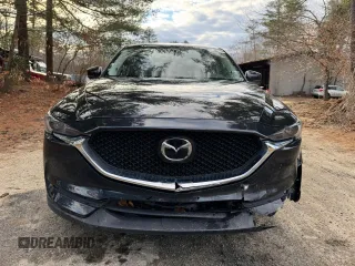 2020 Mazda CX-5 Grand Touring with VIN JM3KFADM8L0785373, listed as a Copart auction lot 50829175 with 135,736 mi miles and Clean Title. Bid and sale history available at DreamBid. Image 14.