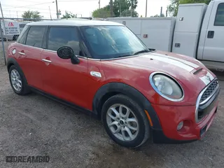 2016 MINI Cooper Hardtop 4 Door S with VIN WMWXU3C56G2D30140, listed as a IAAI auction lot 41883406 with 120,705 mi miles. Bid and sale history available at carsss.com. Image 1.