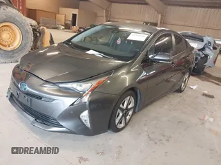 2017 Toyota Prius Two z VIN JTDKARFU7H3041322, wystawiony jako IAAI lot #42358306 z przebiegiem 98 735 mil mil oraz . Historia ofert i sprzedaży dostępna na DreamBid. Obrazek 2.