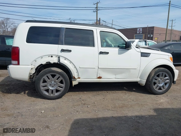 2007 Dodge Nitro R/T with VIN 1D8GU58687W720700, listed as a IAAI auction lot 41802485 with 203,575 mi miles. Bid and sale history available at carsss.com. Image 13.