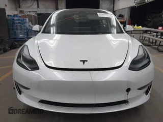 2023 Tesla Model 3 Long Range with VIN 5YJ3E1EB3PF603955, listed as a IAAI auction lot 41915541 with 33,691 mi miles and . Bid and sale history available at DreamBid. Image 12.