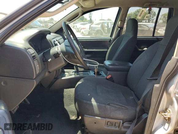 2003 Jeep Grand Cherokee Laredo with VIN 1J4GX48S13C542020, listed as a Copart auction lot 59216755 with 155,344 mi miles and Salvage title. Bid and sale history available at DreamBid. Image 7.