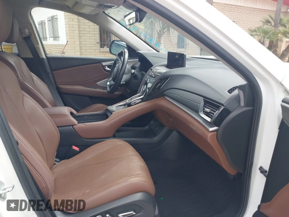 2021 Acura RDX w/Technology Package with VIN 5J8TC1H51ML022573, listed as a IAAI auction lot 41893265 with 56,516 mi miles. Bid and sale history available at carsss.com. Image 5.