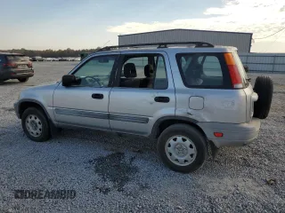 2001 Honda CR-V LX with VIN JHLRD28411S019499, listed as a Copart auction lot 76683944 with 257,124 mi miles and Salvage Title. Bid and sale history available at carsss.com. Image 2.