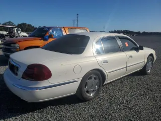 2000 Lincoln Continental with VIN 1LNHM97V0YY795279, listed as a Copart auction lot 76456684 with 0 mi miles and Salvage Title. Bid and sale history available at carsss.com. Image 3.