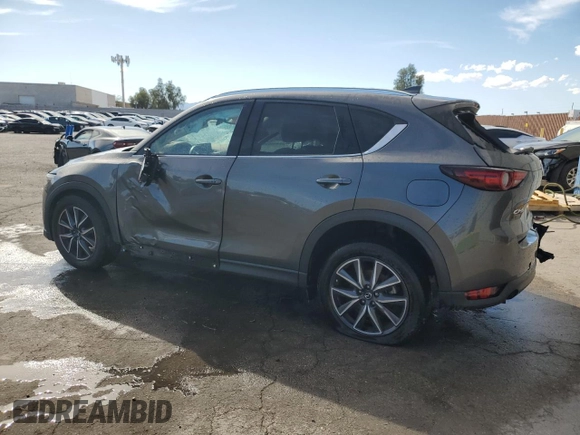 2018 Mazda CX-5 Grand Touring with VIN JM3KFADM1J1426938, listed as a Copart auction lot 50873615 with 83,436 mi miles and Clean Title. Bid and sale history available at carsss.com. Image 2.