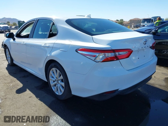 2019 Toyota Camry LE with VIN 4T1B11HK3KU772369, listed as a IAAI auction lot 41353103 with 85,565 mi miles and . Bid and sale history available at DreamBid. Image 3.