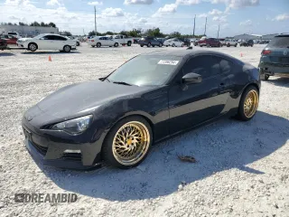 2016 Subaru BRZ Premium with VIN JF1ZCAB16G9602908, listed as a Copart auction lot 77206294 with 79,684 mi miles and Salvage Title. Bid and sale history available at DreamBid. Image 1.