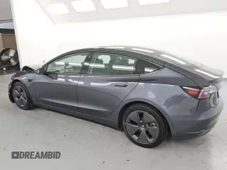 2023 Tesla Model 3 с VIN 5YJ3E1EA3PF450064, выставлен на аукционе Copart как лот 64900735 с пробегом 125 848 миль миль и Чистый • Clean title. История ставок и продаж доступна на DreamBid. Изображение 2.