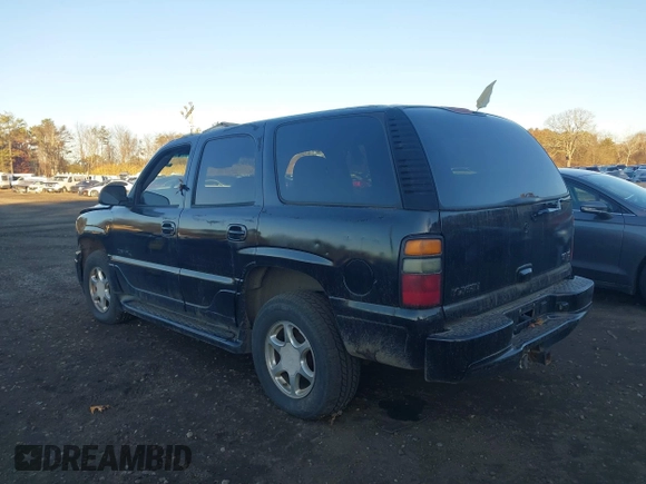 2004 GMC Yukon Denali z VIN 1GKEK63UX4J280662, wystawiony jako IAAI lot #40847473 z przebiegiem 95 677 mil mil oraz . Historia ofert i sprzedaży dostępna na DreamBid. Obrazek 3.