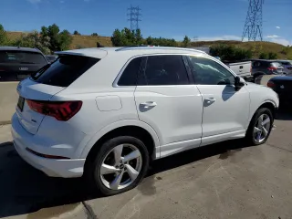 2021 Audi Q3 Premium with VIN WA1AUCF38M1067676, listed as a Copart auction lot 71621704 with 77,395 mi miles and Salvage Title. Bid and sale history available at carsss.com. Image 3.