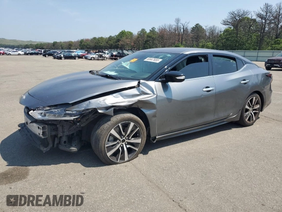 2021 Nissan Maxima SV with VIN 1N4AA6CV5MC504159, listed as a Copart auction lot 60447655 with 80,390 mi miles and Salvage title. Bid and sale history available at DreamBid. Image 1.