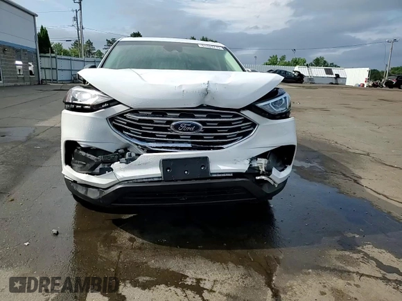 2019 Ford Edge SE z VIN 2FMPK4G94KBB24225, wystawiony jako Copart lot #61424715 z przebiegiem 73 324 mil mil oraz Szkoda całkowita • Salvage title. Historia ofert i sprzedaży dostępna na DreamBid. Obrazek 13.