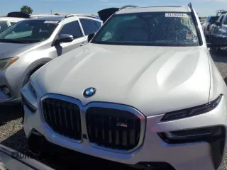 2023 BMW X7 M60i z VIN 5UX33EM07P9P54139, wystawiony jako Copart lot #74120224 z przebiegiem Nie podano mil oraz Szkoda całkowita • Salvage title. Historia ofert i sprzedaży dostępna na DreamBid. Obrazek 5.
