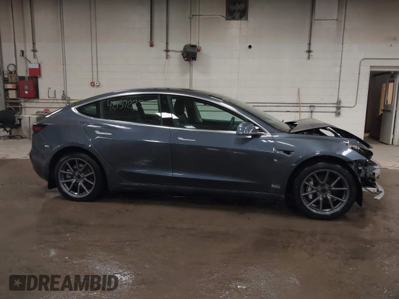 2020 Tesla Model 3 Long Range z VIN 5YJ3E1EB0LF800804, wystawiony jako IAAI lot #42137223 z przebiegiem 52 482 mil mil oraz . Historia ofert i sprzedaży dostępna na DreamBid. Obrazek 14.