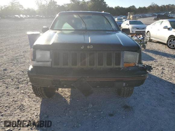 1995 Jeep Grand Cherokee Limited with VIN 1J4GZ78Y7SC730118, listed as a Copart auction lot 76031964 with 184,074 mi miles and Salvage Title. Bid and sale history available at carsss.com. Image 5.